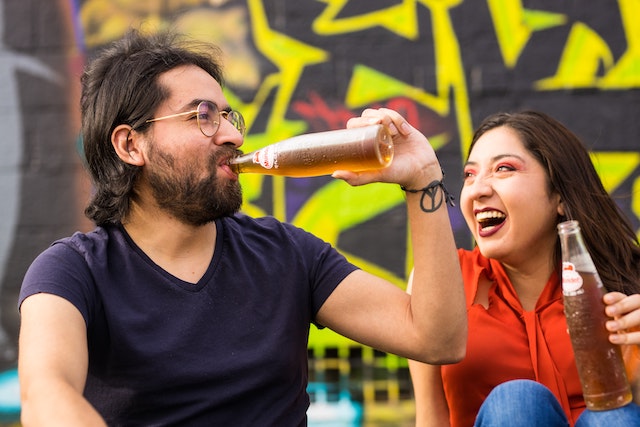 Friends drinking and laughing